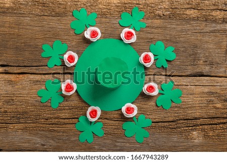 Happy Saint Patrick's Day , shamrock clover leaves with copy space  on wooden Background