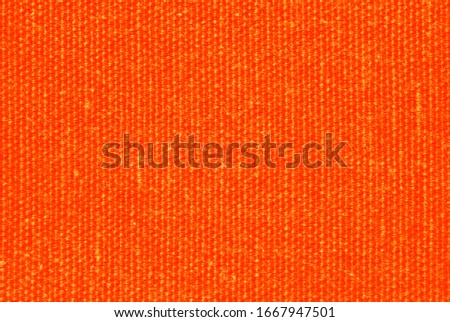 Orange canvas or linen fabric texture as background