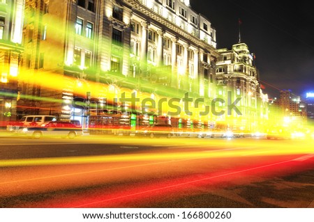 the light trails on the modern building background in shanghai china 