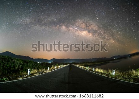 Stars and the Milky Way in the dark night sky are very beautiful.