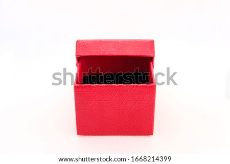 Red gift box isolated on white background. Present love.
