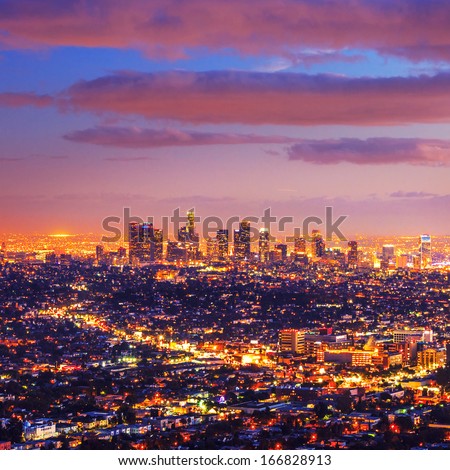 Los Angeles city skyline at dusk after sunset.