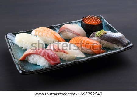 nigirizushi japanese sushi foods sashimi Royalty-Free Stock Photo #1668292540