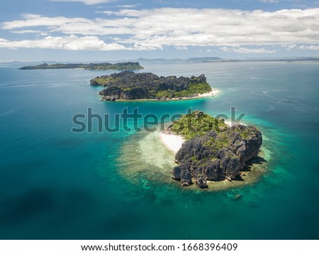 aerial panorama of nosy hara national parc/ aerial drone panorama of uninhabited pristine islands and beaches Royalty-Free Stock Photo #1668396409