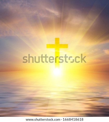 Fog on a sunset background over the sea. Religious Dawn Composition