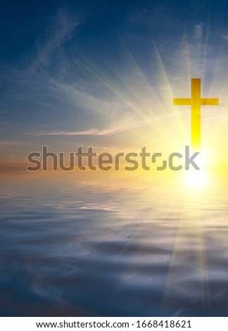 Beautiful calm sea at sunset with sun and cirrus clouds. Religious Dawn Composition