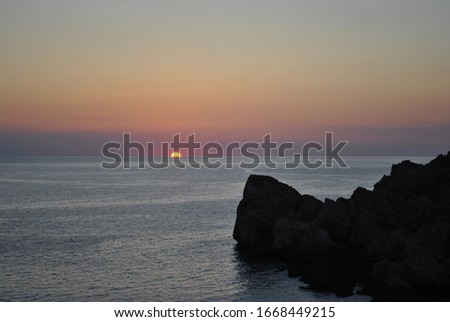 Beautiful Maltese sunset at Anchor Bay