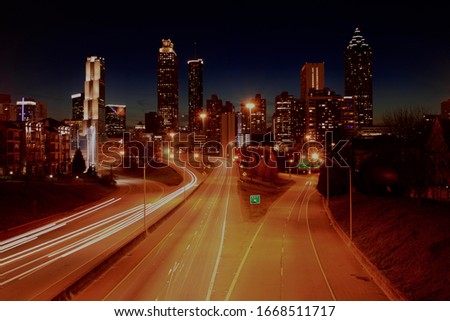 Long exposure of city lighters and highway