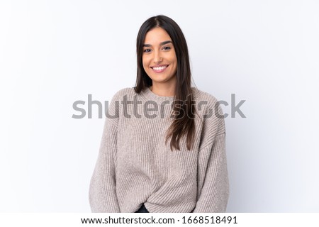 Young brunette woman over isolated white background laughing Royalty-Free Stock Photo #1668518491