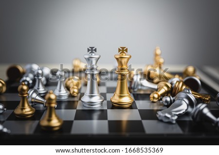 Chess figure king surrounded by falled pawn chess. Business strategy, leadership, success achievement, competition organization concept.
 Royalty-Free Stock Photo #1668535369