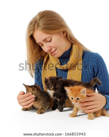 smiling girl with small kittens, white background