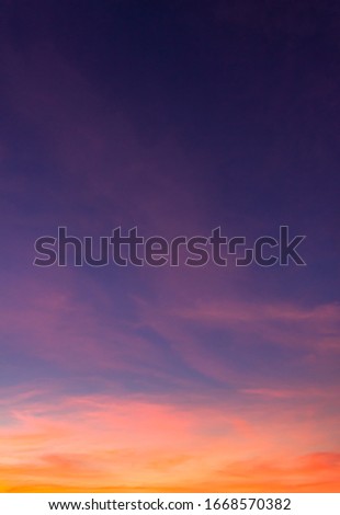 Dusk,Sunset sky twilight in the evening with colorful sunlight and dark blue,majestic ​sky vertical.