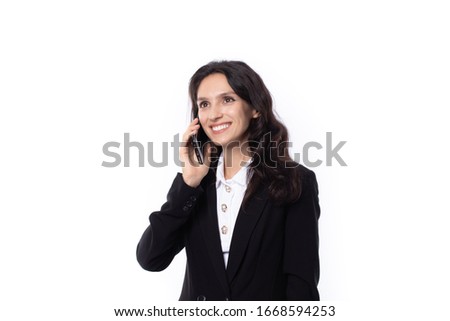 Portrait confident young attractive business woman. Confident young manager wearing black suit looking friendly and smiling isolated on white background. Business woman concept.