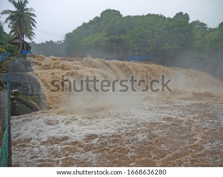 Floods and heavy rain in tropical jungle, Talofofo Famous Small waterfall in water Mist, Guam nature in rain season