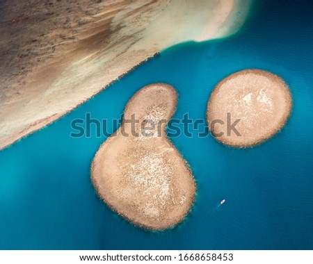 Aerial view of coral reef and small islands off the coast of Honolulu, Hawaii