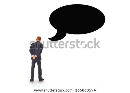 Figurine from Manager with speech bubble on white background