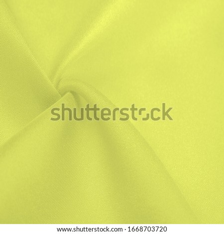 Background texture, Steel Yellow Silk Dupioni, Duppioni or Dupion This is a reversible, crisp, medium-density silk fabric with a fleecy texture and a loose smooth weave. It does not crumple