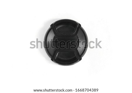 Black lens caps on the white background.