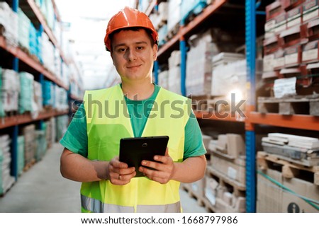 the worker checks the warehouse