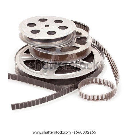Old film reel with strip isolated on a white background.