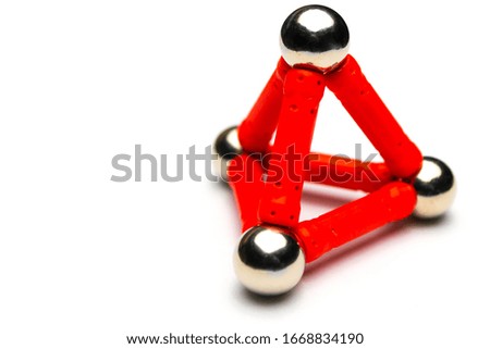 Pyramid of red magnetic constructor
