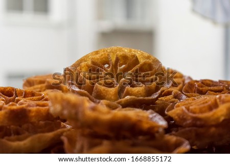 Background of "Flores" (Flowers), traditional Galician dessert in "Entroido" (Carnival Festivity). Royalty-Free Stock Photo #1668855172