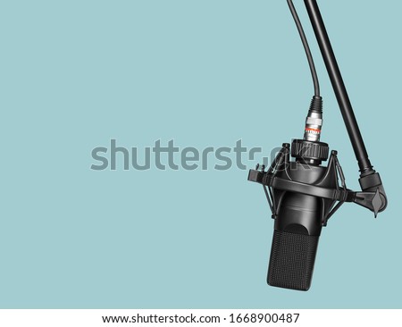 black professional microphone on a stand isolated with clipping path