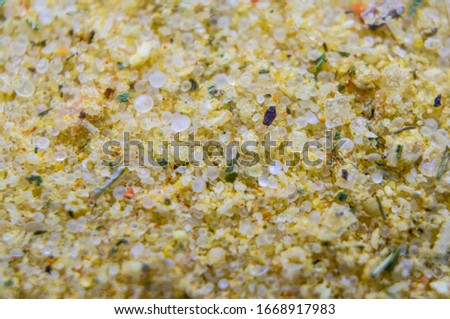 Seasoning for chicken with salt close-up. Macro photography