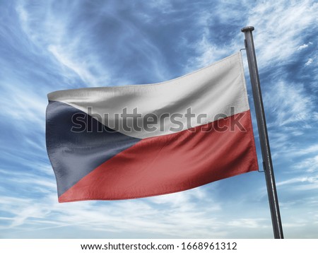 Flag of Czechia on Flag Pole in Blue Sky. Czechia Flag for advertising, celebration, achievement, festival, election. The symbol of the state on wavy cotton fabric.