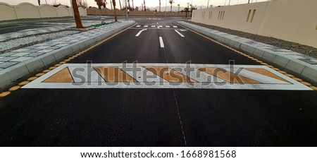Renovated road with bright new road markings.