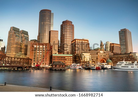 Downtown city view of Boston Massachusetts looking of the riverfront harbor from Fan Pier Park
