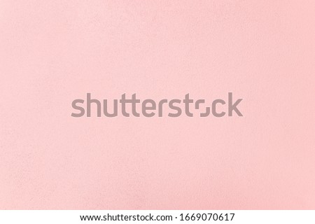 Pink pastel plaster wall painted texture for background.