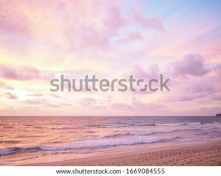 Colorful sunset on the tropical beach with beautiful sky, clouds, soft waves Royalty-Free Stock Photo #1669084555