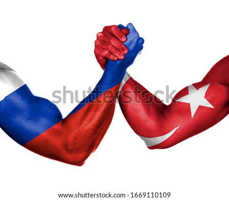 The war between Turkey and Russia, Turkey and Russia hand flags, Arm Wrestling.