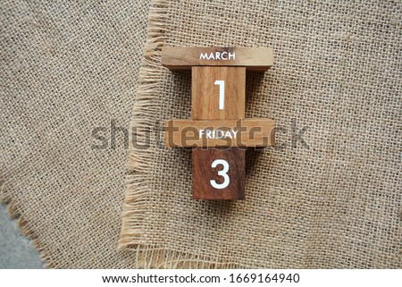 Friday 13th March on wooden calendar. bad luck, Misfortune Day.