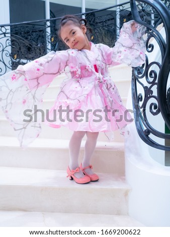 asian little girl Wearing yukata in house