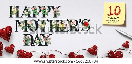 banner with text HAPPY MOTHER'S DAY with flowers and heart-shaped decoration on paper background