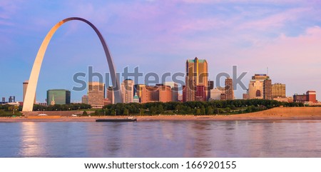St Louis Arch and skyline at the Mississippi river at sunrise seen from East St. Louis