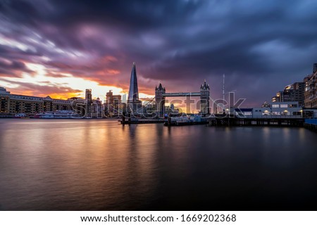 Panoramic long exposure view to the skyline of London during a colorful sunset, United Kingdom