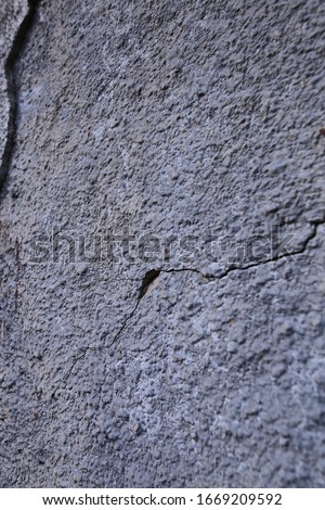wall texture. cracked wall. cracked gray wall. cracked wall texture. old cracked plaster. closeup photo. place for text
