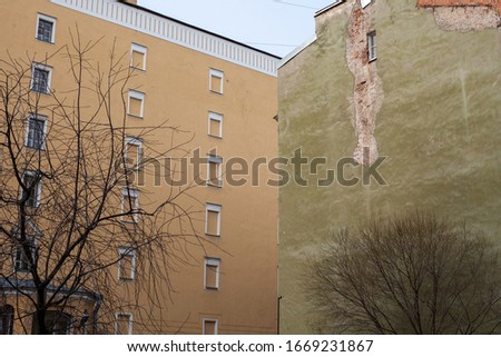 The wall with the Windows of the old houses in Saint-Petersburg