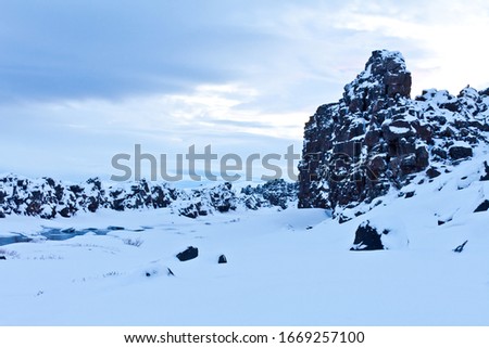 Oxararfoss waterfall landscape in winter, southwestern iceland
