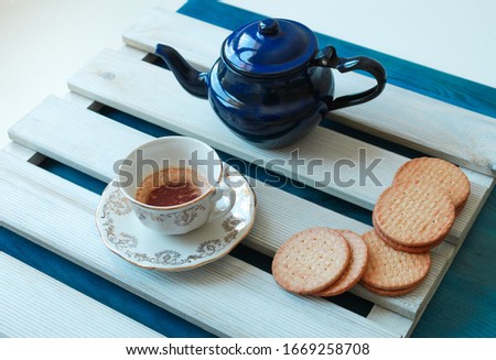 scene of a cup of tea with English style pasta
