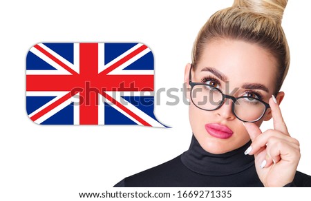 Blonde woman in glasses near dialogue frame with english flag. Speak language concept. Royalty-Free Stock Photo #1669271335