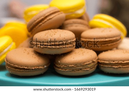 A lot of brown cookies and a little yellow. Very colorful composition.