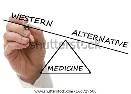 Hand drawing scale with Western versus alternative medicine. Royalty-Free Stock Photo #166929608