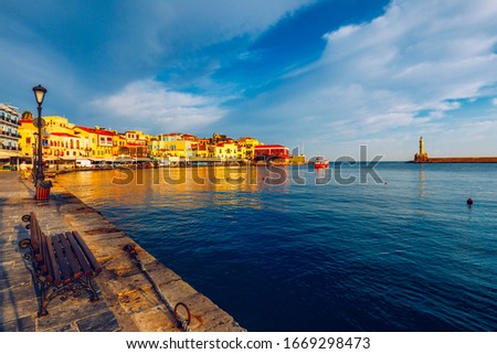 Picturesque old port of Chania. Landmarks of Crete island. Greece. Bay of Chania at sunny summer day, Crete Greece. View of the old port of Chania, Crete, Greece. The port of chania, or Hania.  Royalty-Free Stock Photo #1669298473