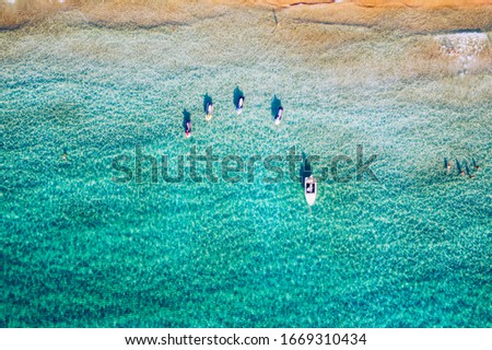 Aerial shot of beautiful turquoise beach Falasarna (Falassarna) in Crete, Greece. View of famous paradise sandy deep turquoise beach of Falasarna (Falassarna) in North West, Crete island, Greece. Royalty-Free Stock Photo #1669310434
