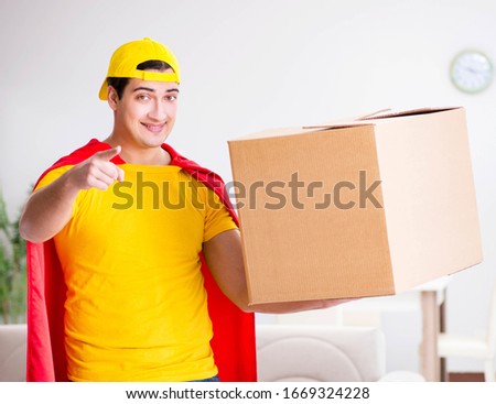 Superhero delivery guy with box
