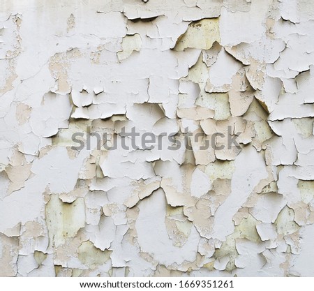 Texture of old peeling paint, vintage graffiti background, it's time to make repairs, cracked paint texture.  Clipart, white, blue old paint, cracked paint                              
